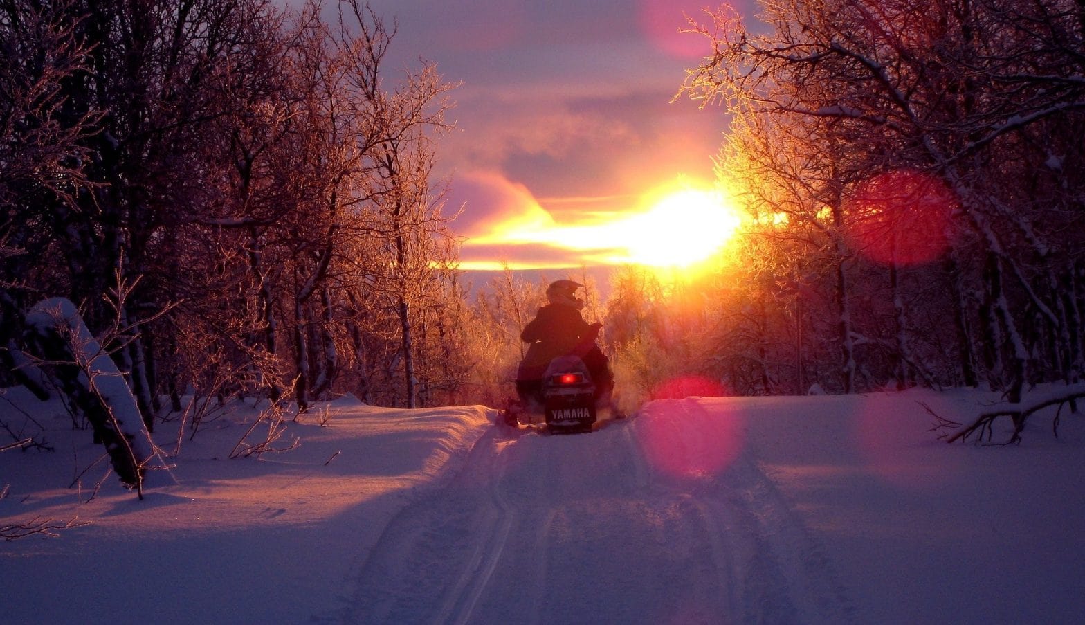 7 Essentials to Bring on Your Snowmobile Trip